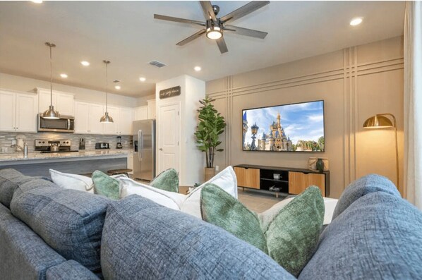 Open living space that seamlessly connects the beautiful kitchen and dining area, offering a perfect blend of comfort and style. You could enjoy a Smart TV and feel just like home!