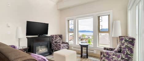 Welcome to our luxurious Harrison Lake Penthouse, where breathtaking natural beauty awaits you!