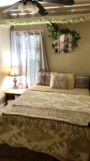 Cozy bedroom with Queen size bed.