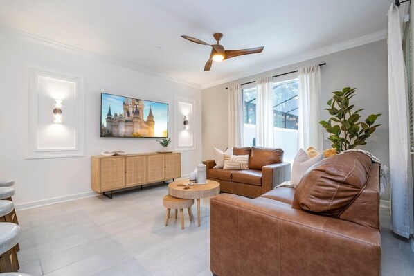 Open living space that seamlessly connects the beautiful kitchen and dining area, offering a perfect blend of comfort and style.
