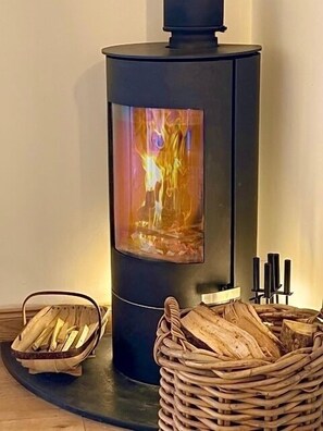 The warmth and ambiance of a log fire 
