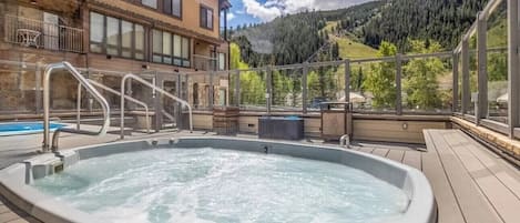 Relax with mountain views from the hot tubs