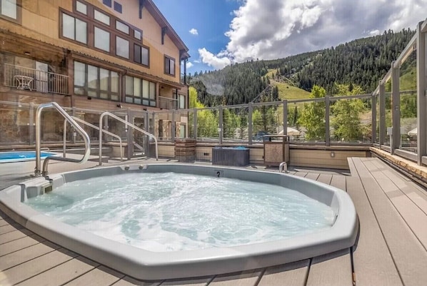 Relax with mountain views from the hot tubs