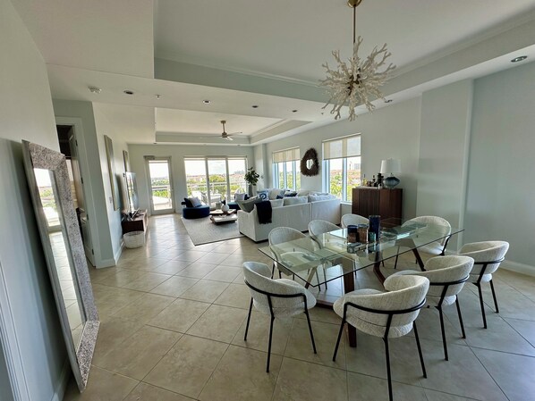 Living and dining areas, sweeping views on lanai.