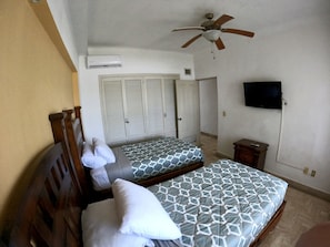 "Screen","Furniture","TV","Indoors","Ceiling Fan"
