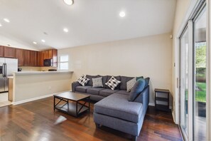 Furniture, Indoors, Living Room, Couch, Floor