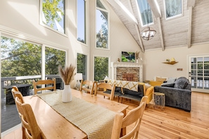 Large floor to ceiling windows overlooking Lake Norman.