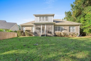 Whole view of the backyard. Let your furry friends have some fun! Note: Not fully fenced.