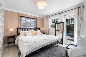 Serene Master Suite with Pool Views | Modern Coastal Luxury. Retreat to this peaceful haven where every detail has been thoughtfully curated for your ultimate comfort. Our master suite offers: Spacious king bedroom with premium mattress Designer boho-chi