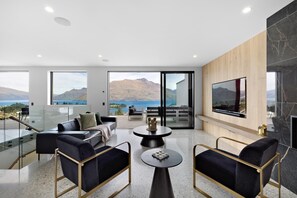 Main living room which opens out onto a fabulous deck with views to die for.