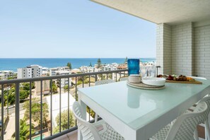 Front balcony faces the ocean where you can enjoy beautiful sea views with a dining space