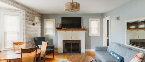 Cozy Living Room with space to kick back, relax, and share a meal.