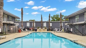 Shared pool and outdoor area with grills!