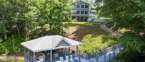 aerial view of deck and rear of home