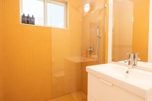 Full bathroom with toilet and shower
