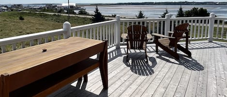 Wrap-around deck overlooking the back yard and North Rustico Harbour