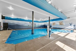 Indoor Pool Paradise: Splash into fun into the heated vibrant indoor pool 
