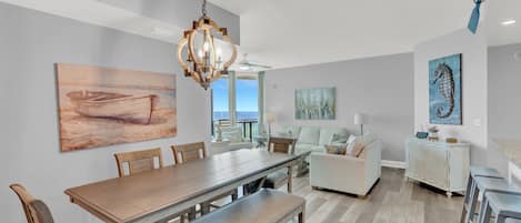 Gulf Front Dining! This beautifully remodeled and decorated home features stunning views of the Gulf of Mexico and Panama City Beach through floor to ceiling windows.