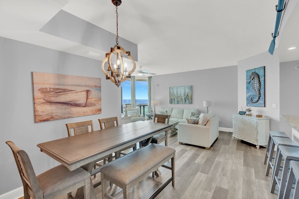 Gulf Front Dining! This beautifully remodeled and decorated home features stunning views of the Gulf of Mexico and Panama City Beach through floor to ceiling windows.