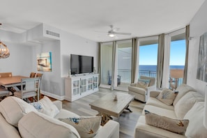 The Living Room features a large Smart TV, board games, plenty of seating, a Queen Sleeper Sofa, and GULF VIEWS!