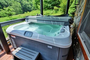 Sooth your cares away in our 5 person spa