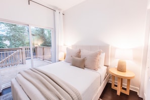 Bedroom 2: Queen Bed + Patio Door