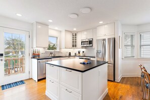 This modern and well-equipped kitchen is a dream for many! "The kitchen is beautiful—ideal for cooking and gathering—with everything you need." -Jeanette W