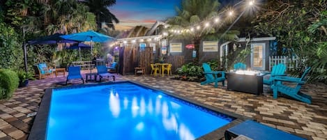 Backyard provides Total Privacy, Heated Pool & Shower, Palm Trees Everywhere