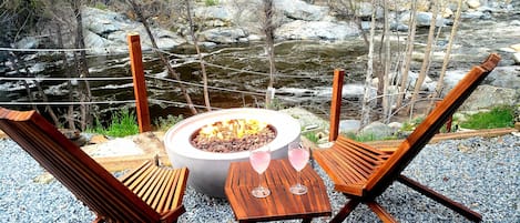 You will enjoy Amazing River Views while sipping wine in front of the Firepit🔥 