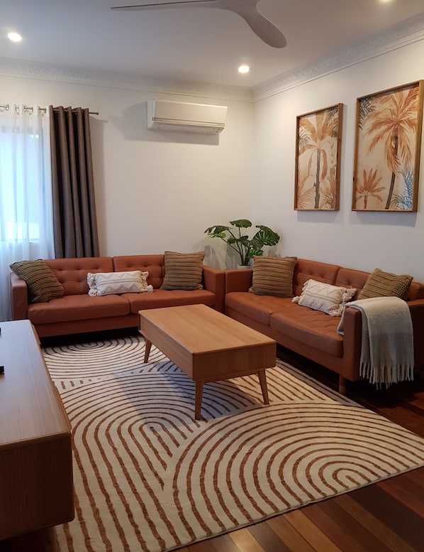 Lounge room with Smart Tv and Air con.