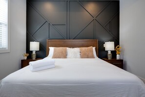 (1st Floor) 4th Bedroom with King bed, walk-in closet, and en-suite bathroom