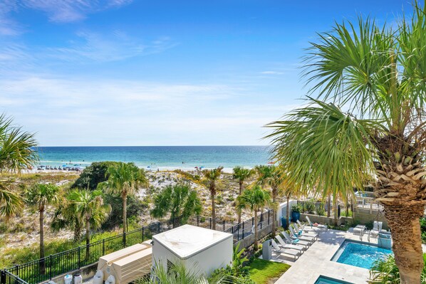 Enjoy Relaxing Views of The Beach and Pool.