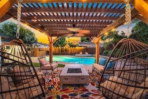 A perfect spot for lounging in the sun or under the stars, complete with comfortable cabana seating