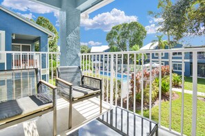 Private Balcony overlooking the courtyard and pool