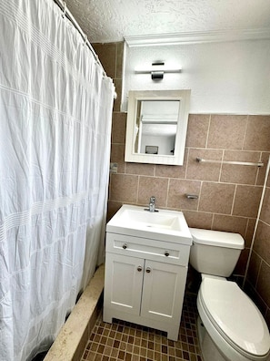Bathroom includes: Shampoo, Conditioner, Body soap , hand soap, hand towel, toilet paper.