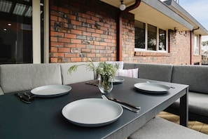 Alfresco deck with BBQ, lounge seating and dining