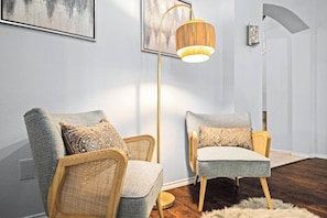 Ideal for quiet moments during an insurance stay, this cozy reading nook provides a peaceful retreat. Unwind here after visiting nearby spots like Sprouts or enjoying a meal at Haywire, making your stay both serene and convenient.
