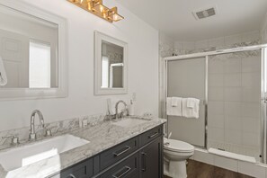 Dual vanity and shower