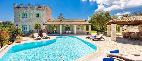 Beautiful villa with private pool, terrace, and garden with sea views
