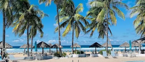 Gorgeous pool right next to the sandy beach and the Caribbean