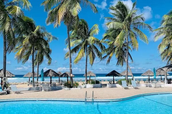 Gorgeous pool right next to the sandy beach and the Caribbean