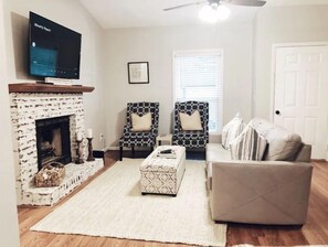 Living room with large smart tv