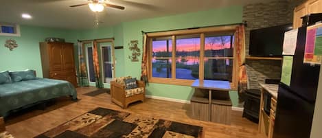See fantastic sunsets and sunrises over the lake from the comfort of the living room!