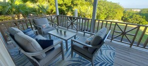 Covered Porch sitting area with an Oceanview