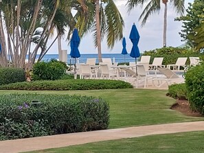 View from Our Unit to Gardens, Pool and Beach