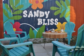 Welcome to *Sandy Bliss*! A vibrant, tropical escape made for pure relaxation.