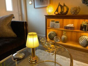 Living room with Sky TV, open gas flame fire, 2 sofas, remote lighting, very warm and cosy! 