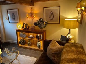 Living room with Sky TV, open gas flame fire, 2 sofas, remote lighting, very warm and cosy! 