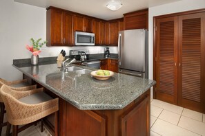 Full kitchen with Stainless Steel appliances.