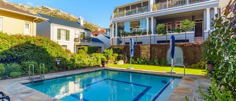 Townhouse looks onto swimming pool